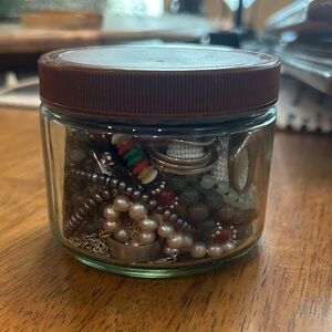 Glass Jar with Assorted Beads and Jewelry